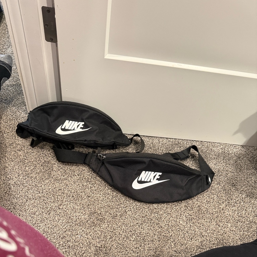 Nike Black Belt Bag with White Logo.